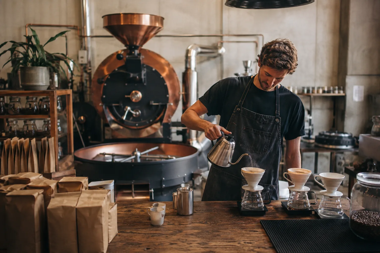 Specialty coffee roastery with roasting equipment and a pour-over bench
