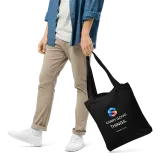 Carry Good Tote in Black — male model, front view