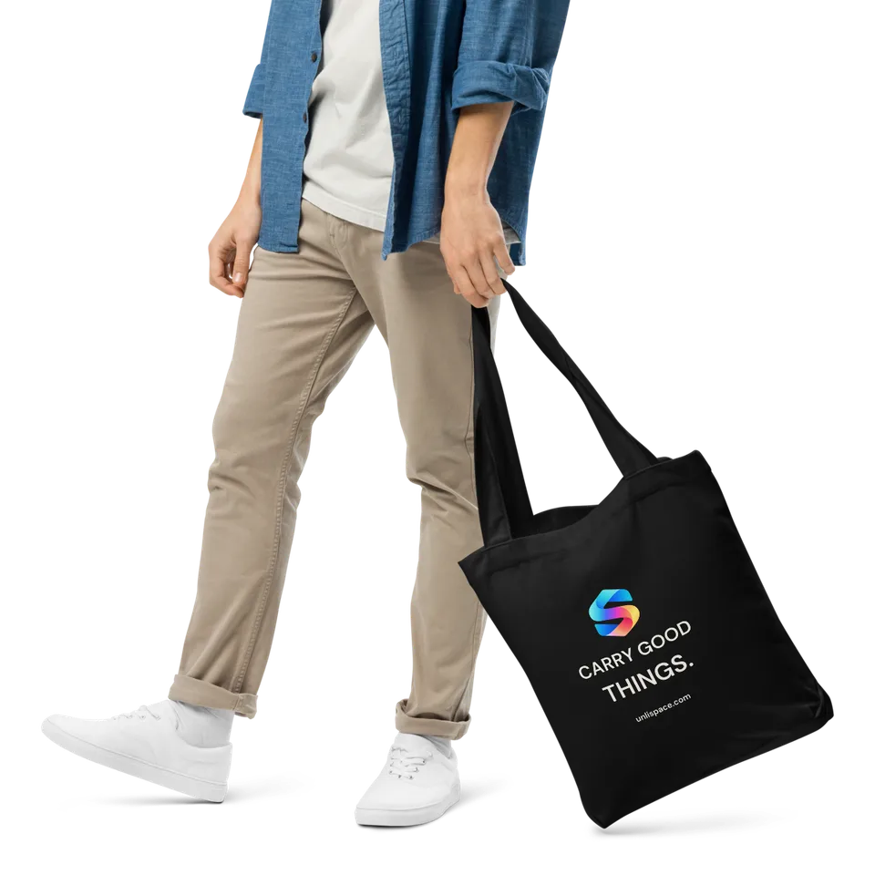 Carry Good Tote in Black — male model, front view